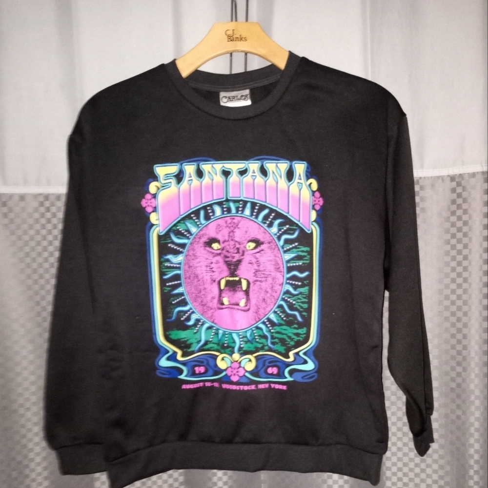 Woman's black Carlos Santana graphic sweatshirt